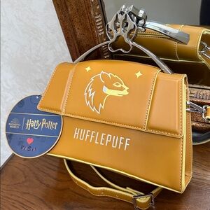 Fred Segal Harry Potter Hufflepuff Mascot flap satchel crossbody bag. Golden.